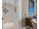 Hallway with modern decor leads to various rooms within the home at 111 S Pineapple Ave # 716, Sarasota, FL 34236