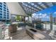 Outdoor lounge area with fire pit and comfortable seating at 111 S Pineapple Ave # 716, Sarasota, FL 34236
