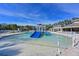 Inviting community pool with splash pad and water features, perfect for families and outdoor enjoyment at 12811 Penguin Dr, Bradenton, FL 34212