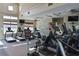Fitness center featuring modern cardio equipment and TV, providing a convenient workout space for residents at 12811 Penguin Dr, Bradenton, FL 34212