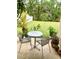 Back porch with patio seating, showcasing the backyard and landscaping at 141 Tierra Verde Way, Bradenton, FL 34212