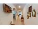 Hallway featuring arched entryways and decorative wall decor at 141 Tierra Verde Way, Bradenton, FL 34212