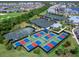 Aerial view of tennis and pickleball courts offering recreational activities within the community at 14214 Heritage Landing Blvd # 817, Punta Gorda, FL 33955