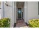 Inviting entryway with brick pavers and greenery, welcomes you home at 14444 59Th E Cir, Bradenton, FL 34211