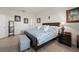 Comfortable main bedroom featuring a cozy bed and tasteful decor at 14444 59Th E Cir, Bradenton, FL 34211