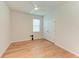 A bedroom with laminate flooring, a ceiling fan and a double door closet for storage at 16109 6Th E Ave, Bradenton, FL 34212