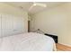Bright bedroom featuring a queen bed, ceiling fan, and closet at 16109 6Th E Ave, Bradenton, FL 34212