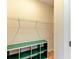 A closet with white wire shelving and a green and white cubby unit provide plentiful storage at 16109 6Th E Ave, Bradenton, FL 34212