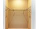 An empty closet with white wire shelving and light brown walls offers ample storage space at 16109 6Th E Ave, Bradenton, FL 34212