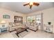 Spacious living room featuring tile floors, neutral walls, comfortable sofas, and large windows at 1731 Redwood St, Sarasota, FL 34231