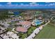 Panoramic aerial view of the community showcasing the clubhouse, golf course, and pool areas at 17510 Gawthrop Dr # 206, Bradenton, FL 34211