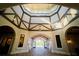 Grand entrance lobby with decorative arches, detailed wood accents, and high ceilings at 17510 Gawthrop Dr # 206, Bradenton, FL 34211