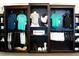 Upscale retail display with neatly folded shirts, activewear, and Lululemon signage on dark wooden shelving at 17510 Gawthrop Dr # 206, Bradenton, FL 34211