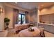 Tranquil spa room featuring two treatment tables with soothing decor and soft lighting at 17510 Gawthrop Dr # 206, Bradenton, FL 34211