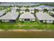 Waterfront homes boast lush lawns and screened lanais, offering serene outdoor living at 17885 Cherished Loop, Bradenton, FL 34211