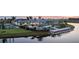 Community clubhouse with pool, tennis court, and lakefront access at 17885 Cherished Loop, Bradenton, FL 34211