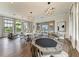 Expansive clubhouse offering diverse seating options, including game tables and lounge areas at 17885 Cherished Loop, Bradenton, FL 34211