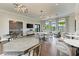 Bright and airy clubhouse featuring a kitchenette, game tables, and ample seating areas at 17885 Cherished Loop, Bradenton, FL 34211