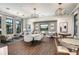 Spacious clubhouse area featuring ample seating, modern lighting fixtures, and elegant decor at 17885 Cherished Loop, Bradenton, FL 34211