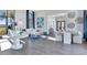 Bright and airy lounge with elegant decor, comfortable seating, and stylish accents at 17885 Cherished Loop, Bradenton, FL 34211