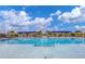 Enjoy the sunshine at this community pool with shaded seating areas at 17885 Cherished Loop, Bradenton, FL 34211