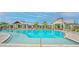 Resort-style pool with ample lounge seating and lush landscaping in a beautiful community at 17885 Cherished Loop, Bradenton, FL 34211