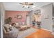 Bright living room with hardwood floors, stylish decor, and a cozy seating area at 1789 Elm Dr, Venice, FL 34293