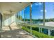 This lovely patio features ample lighting and gorgeous outdoor views, offering peace and relaxation at 2100 Benjamin Franklin Dr # 201, Sarasota, FL 34236