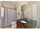 Clean bathroom featuring a double sink vanity, a shower with curtains, and ample space at 2221 Bahia Vista St, Sarasota, FL 34239