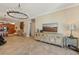 Bright living room showcases a decorative console and large television, with open flow to the kitchen at 2221 Bahia Vista St, Sarasota, FL 34239