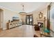 Bright living room with a decorative fireplace and patio access at 2221 Bahia Vista St, Sarasota, FL 34239