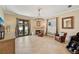Spacious living room with a fireplace and backyard patio access at 2221 Bahia Vista St, Sarasota, FL 34239