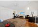 Bonus room provides an office and work-out space, hardwood floors, fan, and storage at 2282 Harbour Court Dr, Longboat Key, FL 34228