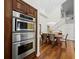 Modern Kitchen with built in oven/microwave adjacent to the dining room at 2282 Harbour Court Dr, Longboat Key, FL 34228