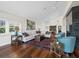 Elegant living room showcasing hardwood floors, stylish furniture, and an open layout perfect for entertaining at 2282 Harbour Court Dr, Longboat Key, FL 34228