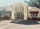 Exterior shot of the clubhouse with a covered entrance in a community building at 242 Hidden Bay Dr # 603, Osprey, FL 34229