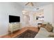 Comfortable living room with tile flooring, open layout, and views of the dining area and kitchen at 242 Hidden Bay Dr # 603, Osprey, FL 34229