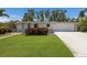 Charming one-story home featuring well-kept lawn and a two-car garage in a desirable location at 2560 Sunnyside St, Sarasota, FL 34239