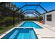 Screened in pool and hot tub offers a private oasis for relaxation and recreation at 2560 Sunnyside St, Sarasota, FL 34239