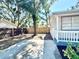 The backyard has new wooden fence, mature trees, and a spacious backyard at 2721 7Th W St, Bradenton, FL 34205
