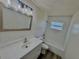 Bathroom featuring a vanity, tile accent wall, and combined shower and tub at 2721 7Th W St, Bradenton, FL 34205