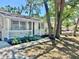 Well-maintained home with landscaped front yard and a welcoming front porch at 2721 7Th W St, Bradenton, FL 34205
