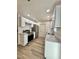 Well-lit kitchen showcasing white cabinets, stainless steel appliances, and attractive countertops at 2721 7Th W St, Bradenton, FL 34205
