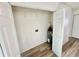 Utility room with washer and dryer hookups, water heater, and ample storage space at 2721 7Th W St, Bradenton, FL 34205