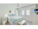 Comfortable bedroom with bright lighting, cozy bed, and plenty of storage at 3213 Cambridge Ave, Bradenton, FL 34207