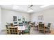 Cozy card room with multiple tables and comfortable chairs, ideal for game nights at 3213 Cambridge Ave, Bradenton, FL 34207