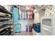 Walk-in closet with custom shelving and organization for shoes, clothes and storage at 3213 Cambridge Ave, Bradenton, FL 34207
