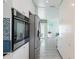 Well-appointed kitchen with stainless steel appliances, ample storage, and open layout at 3213 Cambridge Ave, Bradenton, FL 34207