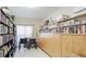 Well-stocked library with shelves filled with books and comfortable seating for reading at 3213 Cambridge Ave, Bradenton, FL 34207