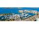 Breathtaking aerial view showcasing a marina filled with boats, city buildings, and bay at 33 S Palm Ave # 1602, Sarasota, FL 34236